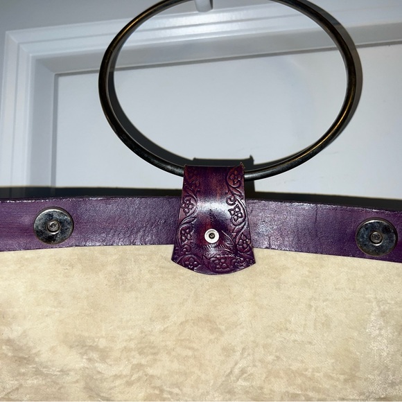 Handmade Leather stamped handbag with circular metal ring handles. - Picture 8 of 11